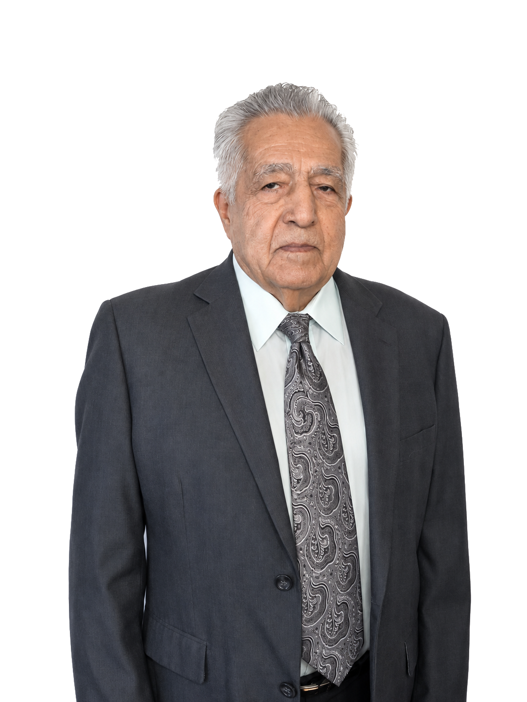 Retrato de Sergio Guerrero Valdovinos, 81 años, con traje, mirando de frente